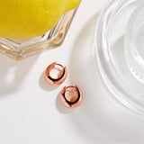 Arco Rose Gold Huggie Earrings